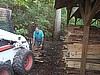 Sid adding wood to the pile